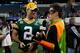 ARLINGTON, TX - FEBRUARY 01: Mason Crosby #2 of the Green Bay Packers is interviewed by a member of the media dresses a superhero during Super Bowl XLV Media Day ahead of Super Bowl XLV at Cowboys Stadium on February 1, 2011 in Arlington, Texas. The Pittsburgh Steelers will play the Green Bay Packers in Super Bowl XLV on February 6, 2011 at Cowboys Stadium. (Photo by Scott Halleran/Getty Images)