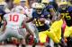 ANN ARBOR, MI - NOVEMBER 26: Denard Robinson #16 of the Michigan Wolverines tries to get around the tackle of Ryan Shazier #10 of the Ohio State Buckeyes at Michigan Stadium on November 26, 2011 in Ann Arbor, Michigan. Michigan won the game 40-34. (Photo by Gregory Shamus/Getty Images)