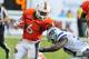 MIAMI GARDENS, FL - SEPTEMBER 24: Running back Lamar Miller #6 of the Miami Hurricanes rushes upfield against the Kansas State University Wildcats September 24, 2011 at Sun Life Stadium in Miami Gardens, Florida. (Photo by Al Messerschmidt/Getty Images)