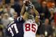 GLENDALE, AZ - FEBRUARY 03: David Tyree #85 of the New York Giants catches a 32-yard pass from Eli Manning #10 as Rodney Harrison #37 of the New England Patriots attempts to knock it out in the fourth quarter of Super Bowl XLII on February 3, 2008 at the University of Phoenix Stadium in Glendale, Arizona. (Photo by Donald Miralle/Getty Images)