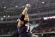 FOXBORO, MA - DECEMBER 19: Sebastian Vollmer #76 of the New England Patriots celebrates as he runs off the field after defeating the Green Bay Packers 31-27 at Gillette Stadium on December 19, 2010 in Foxboro, Massachusetts. (Photo by Elsa/Getty Images)