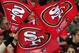 LONDON, ENGLAND - OCTOBER 31: San Francisco 49ers fans waves flags in support of their team during the NFL International Series match between Denver Broncos and San Francisco 49ers at Wembley Stadium on October 31, 2010 in London, England. This is the fourth occasion where a regular season NFL match has been played in London. (Photo by Warren Little/Getty Images)
