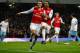 LONDON, ENGLAND - JANUARY 29: Robin van Persie of Arsenal (L) celebrates with Theo Walcott as he scores their third goal from the penalty spot during the FA Cup with Budweiser Fourth Round match between Arsenal and Aston Villa at Emirates Stadium on January 29, 2012 in London, England. (Photo by Paul Gilham/Getty Images)
