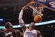 ORLANDO, FL - DECEMBER 21: Dwight Howard #12 of the Orlando Magic dunks over Terrel Harris #14 of the Miami Heat during a preseason game at Amway Center on December 21, 2011 in Orlando, Florida. NOTE TO USER: User expressly acknowledges and agrees that, by downloading and/or using this Photograph, User is consenting to the terms and conditions of the Getty Images License Agreement. (Photo by Mike Ehrmann/Getty Images)