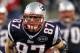 FOXBORO, MA - JANUARY 22: Rob Gronkowski #87 of the New England Patriots runs with the ball against the Baltimore Ravens during their AFC Championship Game at Gillette Stadium on January 22, 2012 in Foxboro, Massachusetts. (Photo by Jim Rogash/Getty Images)