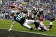 CHARLOTTE, NC - DECEMBER 24: Jeremy Shockey #80 of the Carolina Panthers dives for a touchdown against Ahmad Black #43 of the Tampa Bay Buccaneers during their game at Bank of America Stadium on December 24, 2011 in Charlotte, North Carolina. (Photo by Streeter Lecka/Getty Images)
