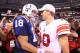 INDIANAPOLIS - SEPTEMBER 19: Eli Manning #10 of the New York Giants and Peyton Manning #18 of the Indianapolis Colts embrace following the Colts 38-14 win at Lucas Oil Stadium on September 19, 2010 in Indianapolis, Indiana. (Photo by Andy Lyons/Getty Images)