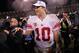 SAN FRANCISCO, CA - JANUARY 22: Eli Manning #10 of the New York Giants celebrates after the GIants won 20-17 in overtime against the San Francisco 49ers during the NFC Championship Game at Candlestick Park on January 22, 2012 in San Francisco, California. (Photo by Doug Pensinger/Getty Images)
