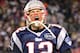 FOXBORO, MA - JANUARY 22: Tom Brady #12 of the New England Patriots celebrates after a touchdown in the fourth quarter against the Baltimore Ravens during their AFC Championship Game at Gillette Stadium on January 22, 2012 in Foxboro, Massachusetts. (Photo by Jim Rogash/Getty Images)