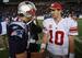 QBs Eli Manning and Tom Brady shake hands during the November 2011 matchup.