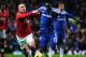 Rooney and Essien tussle
