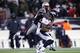 FOXBORO, MA - JANUARY 14: Demaryius Thomas #88 of the Denver Broncos makes a reception against Kyle Arrington #24 of the New England Patriots during their AFC Divisional Playoff Game at Gillette Stadium on January 14, 2012 in Foxboro, Massachusetts. (Photo by Elsa/Getty Images)