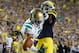 ANN ARBOR, MI - SEPTEMBER 10: TJ Jones #7 of the Notre Dame Fighting Irish can't pull in a pass around the defense of Courtney Avery #5 of the Michigan Wolverines at Michigan Stadium on September 10, 2010 in Ann Arbor, Michigan. Avery was called for pass interference. Michigan won the game 35-31. (Photo by Gregory Shamus/Getty Images)