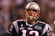 INDIANAPOLIS, IN - FEBRUARY 05: Quarterback Tom Brady #12 of the New England Patriots stands on the field prior to Super Bowl XLVI against the New York Giants at Lucas Oil Stadium on February 5, 2012 in Indianapolis, Indiana. (Photo by Jamie Squire/Getty Images)