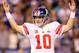 INDIANAPOLIS, IN - FEBRUARY 05: Quarterback Eli Manning #10 of the New York Giants celebrates after Runningback Ahmad Bradshaw #44 ran the ball for a 6 yard touchdown in the fourth quarter against the New England Patriots during Super Bowl XLVI at Lucas Oil Stadium on February 5, 2012 in Indianapolis, Indiana. (Photo by Jamie Squire/Getty Images)