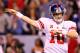INDIANAPOLIS, IN - FEBRUARY 05: Eli Manning #10 of the New York Giants reacts in the first half while taking on the New England Patriots during Super Bowl XLVI at Lucas Oil Stadium on February 5, 2012 in Indianapolis, Indiana. Manning, named MVP, led the Giants to a 21-17 victory. (Photo by Al Bello/Getty Images)