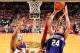 COLUMBUS, OH - DECEMBER 28: John Shurna #24 of the Northwestern Wildcats attempts a shot underneath the basket as Jared Sullinger #0 of the Ohio State Buckeyes defends on December 28, 2011 at Value City Arena in Columbus, Ohio. Ohio State defeated Northwestern 87-54. (Photo by Jamie Sabau/Getty Images)