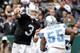 OAKLAND, CA - DECEMBER 18: Carson Palmer #3 of the Oakland Raiders throws a pass under presure from Stephen Tulloch #55 of the Detroit Lions at O.co Coliseum on December 18, 2011 in Oakland, California. (Photo by Thearon W. Henderson/Getty Images)