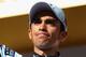 ALPE D'HUEZ, FRANCE - JULY 22: Alberto Contador of Spain and Saxo Bank Sungard looks disappointed after receiving the performance of the day award but heads into the final two stages 03'55@@ adrift of the race leader after Stage 19 of the 2011 Tour de France from Modane to Alpe d'Huez on July 22, 2011 in Alpe d'Huez, France. (Photo by Michael Steele/Getty Images)