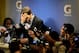 INDIANAPOLIS, IN - FEBRUARY 05: Quarterback Tom Brady #12 of the New England Patriots speaks to the media after losing to the New York Giants in Super Bowl XLVI at Lucas Oil Stadium on February 5, 2012 in Indianapolis, Indiana. The New York Giants defeated the New England Patriots 21-17. (Photo by Jamie Squire/Getty Images)