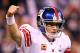 INDIANAPOLIS, IN - FEBRUARY 05: Eli Manning #10 of the New York Giants reacts in the first half while taking on the New England Patriots during Super Bowl XLVI at Lucas Oil Stadium on February 5, 2012 in Indianapolis, Indiana. Manning, named MVP, led the Giants to a 21-17 victory. (Photo by Al Bello/Getty Images)