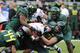 EUGENE, OR - NOVEMBER 26: Running back Jovan Stevenson #19 of the Oregon State Beavers is gang tackled by defensive end Brandon Hanna #44, defensive end Terrell Turner #45 o and defensive tackle Taylor Hart #66 of the Oregon Ducks in the second quarter of the game at Autzen Stadium on November 26, 2011 in Eugene, Oregon. (Photo by Steve Dykes/Getty Images)