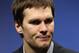 INDIANAPOLIS, IN - FEBRUARY 05: Quarterback Tom Brady #12 of the New England Patriots speaks to the media after losing to the New York Giants in Super Bowl XLVI at Lucas Oil Stadium on February 5, 2012 in Indianapolis, Indiana. The New York Giants defeated the New England Patriots 21-17. (Photo by Jamie Squire/Getty Images)