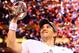 INDIANAPOLIS, IN - FEBRUARY 05: Eli Manning #10 of the New York Giants hoist the Vince Lombardi Trophy after defeating the New England Patriots in Super Bowl XLVI at Lucas Oil Stadium on February 5, 2012 in Indianapolis, Indiana. The New York Giants defeated the New England Patriots 21-17. (Photo by Al Bello/Getty Images)