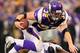 Toby Gerhart leaps over a defender