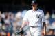NEW YORK, NY - SEPTEMBER 19: A.J. Burnett #34 of the New York Yankees walks off the field during the fifth inning against the Minnesota Twins at Yankee Stadium on September 19, 2011 in the Bronx borough of New York City. (Photo by Patrick McDermott/Getty Images)