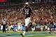 CHARLOTTE, NC - SEPTEMBER 03: Antonio Allen #26 of the South Carolina Gamecocks celebrates after a touchdown against the East Carolina Pirates during their game at Bank of America Stadium on September 3, 2011 in Charlotte, North Carolina. (Photo by Streeter Lecka/Getty Images)