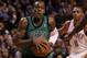 BOSTON, MA - JANUARY 16: Rajon Rondo #9 of the Boston Celtics heads for the net as Russell Westbrook #0 of the Oklahoma City Thunder defends on January 16, 2012 at TD Garden in Boston, Massachusetts. NOTE TO USER: User expressly acknowledges and agrees that, by downloading and or using this photograph, User is consenting to the terms and conditions of the Getty Images License Agreement. (Photo by Elsa/Getty Images)