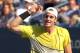 NEW YORK, NY - SEPTEMBER 09: John Isner of the United States celebrates after a point against Andy Murray of Great Britain during Day Twelve of the 2011 US Open at the USTA Billie Jean King National Tennis Center on September 9, 2011 in the Flushing neighborhood of the Queens borough of New York City. (Photo by Al Bello/Getty Images)