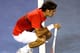 MELBOURNE, AUSTRALIA - JANUARY 26: Roger Federer of Switzerland looks at a line call in his semifinal match against Rafael Nadal of Spain during day eleven of the 2012 Australian Open at Melbourne Park on January 26, 2012 in Melbourne, Australia. (Photo by Robert Prezioso/Getty Images)