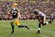 GREEN BAY, WI - NOVEMBER 20: Jordy Nelson #87 of the Green Bay Packers races for the endzone after making a reception against Myron Lewis #23 of the Tampa Bay Buccaneers at Lambeau Field on November 20, 2011 in Green Bay, Wisconsin. (Photo by Matthew Stockman/Getty Images)