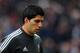 MANCHESTER, ENGLAND - FEBRUARY 11: Luis Suarez of Liverpool walks off after the warm up prior to the Barclays Premier League match between Manchester United and Liverpool at Old Trafford on February 11, 2012 in Manchester, England. (Photo by Shaun Botterill/Getty Images)