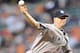 BALTIMORE, MD - AUGUST 26: A.J. Burnett #34 of the New York Yankees pitches during a baseball game against the Baltimore Orioles at Oriole Park at Camden Yards on August 26, 2011 in Baltimore, Maryland. (Photo by Mitchell Layton/Getty Images)