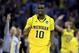 CHARLOTTE, NC - MARCH 20: Tim Hardaway Jr. #10 of the Michigan Wolverines reacts after making a three-pointer in the second half while taking on the Duke Blue Devils during the third round of the 2011 NCAA men's basketball tournament at Time Warner Cable Arena on March 20, 2011 in Charlotte, North Carolina. (Photo by Streeter Lecka/Getty Images)