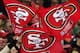 LONDON, ENGLAND - OCTOBER 31: San Francisco 49ers fans waves flags in support of their team during the NFL International Series match between Denver Broncos and San Francisco 49ers at Wembley Stadium on October 31, 2010 in London, England. This is the fourth occasion where a regular season NFL match has been played in London. (Photo by Warren Little/Getty Images)