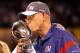 INDIANAPOLIS, IN - FEBRUARY 05: Head coach Tom Coughlin of the New York Giants kisses the Vince Lombardi Trophy after defeating the New England Patriots in Super Bowl XLVI at Lucas Oil Stadium on February 5, 2012 in Indianapolis, Indiana. The New York Giants defeated the New England Patriots 21-17. (Photo by Jamie Squire/Getty Images)