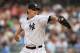 NEW YORK, NY - JUNE 08: A.J. Burnett #34 of the New York Yankees pitches against the Boston Red Sox during their game on June 8, 2011 at Yankee Stadium in the Bronx borough of New York City. (Photo by Al Bello/Getty Images)