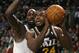 BOSTON, MA - JANUARY 21: Paul Millsap #24 of the Utah Jazz heads for the net as Kevin Garnett #5 of the Boston Celtics defends on January 21, 2011 at the TD Garden in Boston, Massachusetts. NOTE TO USER: User expressly acknowledges and agrees that, by downloading and/or using this Photograph, User is consenting to the terms and conditions of the Getty Images License Agreement. (Photo by Elsa/Getty Images)