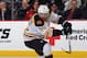 NEWARK, NJ - JANUARY 19: Johnny Boychuk #55 of the Boston Bruins skates against the New Jersey Devils at the Prudential Center on January 19, 2012 in Newark, New Jersey. (Photo by Bruce Bennett/Getty Images)