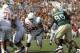 WACO, TX - NOVEMBER 14: Running back Cody Johnson #31 of the Texas Longhorns carries the ball into the end zone during the first half against tackle Nicolas Jean-Baptiste #90 of the Baylor Bears on November 14, 2009 at Floyd Casey Stadium in Waco, Texas. The Longhorns beat the Bears 47-14. (Photo by Tom Pennington/Getty Images)