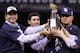 ST PETERSBURG, FL - OCTOBER 19: Principal owner of the Tampa Bay Devil Rays, Stuart Sternberg (L) and manager Joe Maddon (R) celebrate with the American League Champion's trophy after defeating the Boston Red Sox in game seven of the American League Championship Series during the 2008 MLB playoffs on October 19, 2008 at Tropicana Field in St Petersburg, Florida. The Rays defeated the Red Sox 3-1 to win the series 4-3. (Photo by Doug Pensinger/Getty Images)