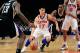 NEW YORK, NY - FEBRUARY 15: Jeremy Lin #17 of the New York Knicks drives past Marcus Thornton #23 of the Sacramento Kings at Madison Square Garden on February 15, 2012 in New York City. NOTE TO USER: User expressly acknowledges and agrees that, by downloading and/or using this Photograph, user is consenting to the terms and conditions of the Getty Images License Agreement. (Photo by Chris Trotman/Getty Images)