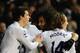 LONDON, ENGLAND - FEBRUARY 11: Gareth Bale and Luka Modric of Spurs celebrate with goal scorer Benoit Assou-Ekotto of Spurs after he scored the opening goal during the Barclays Premier League match between Tottenham Hotspur and Newcastle United at White Hart Lane on February 11, 2012 in London, England. (Photo by Mike Hewitt/Getty Images)