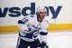 UNIONDALE, NY - DECEMBER 06: Dominic Moore #19 of the Tampa Bay Lightning skates against the New York Islanders at the Nassau Veterans Memorial Coliseum on December 6, 2011 in Uniondale, New York. The Islanders defeated the Lightning 5-1. (Photo by Bruce Bennett/Getty Images)