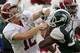 ORLANDO, FL - JANUARY 01: Greg McElroy #12 of the Alabama Crimson Tide blocks Trenton Robinson #39 of the Michigan State Spartans on a touchdown run during the Capitol One Bowl at the Florida Citrus Bowl on January 1, 2011 in Orlando, Florida. (Photo by Mike Ehrmann/Getty Images)