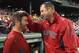 BOSTON, MA - SEPTEMBER 13: Tim Wakefield #49 of the Boston Red Sox reacts with teammate Jason Varitek #33 of the Boston Red Sox after earning his 200th win after a game with the Toronto Blue Jays at Fenway Park on September 13, 2011 in Boston, Massachusetts. (Photo by Jim Rogash/Getty Images)